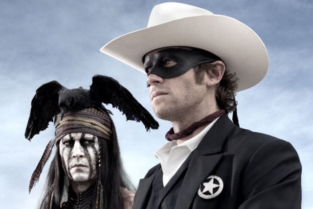 Johnny Depp and Armie Hammer looking forward with blue sky behind them in the Lone Ranger