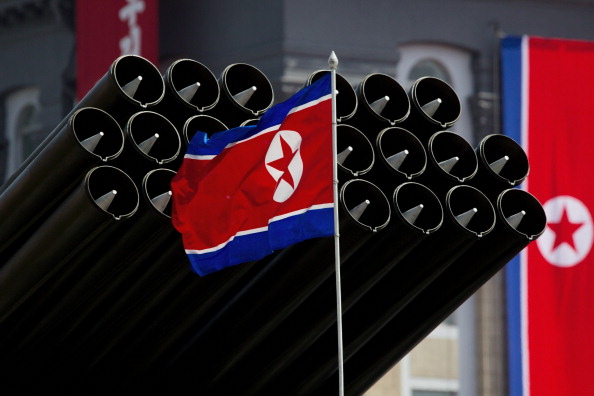 The North Korean flag and weapons