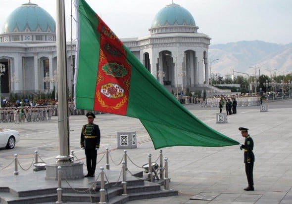 Soldiers raise the flag in Turkmenistan