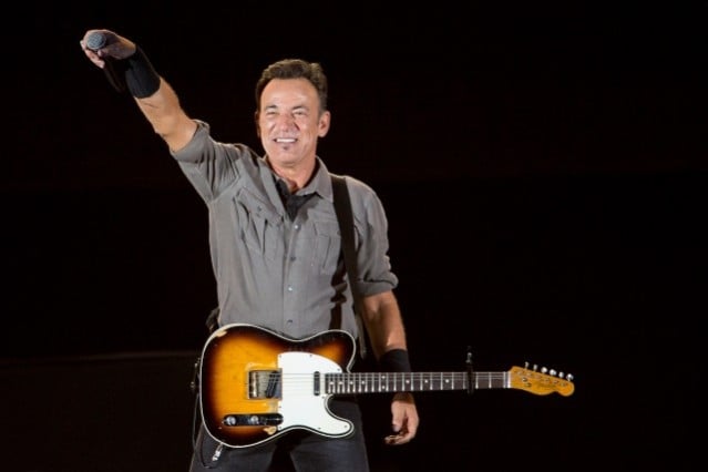 Bruce Springsteen on stage with his guitar