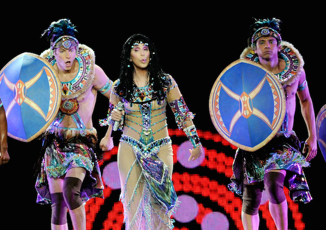 Cher performing in costume