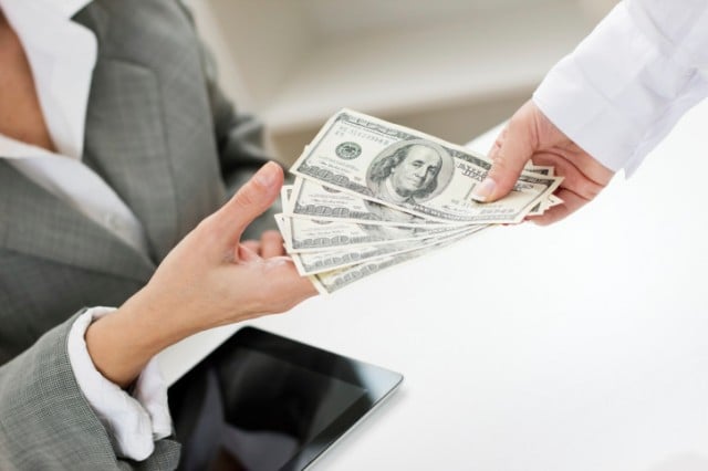 People exchanging money