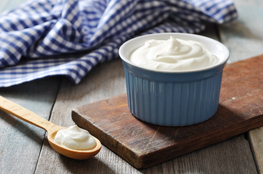blue ramekin filled with Greek yogurt