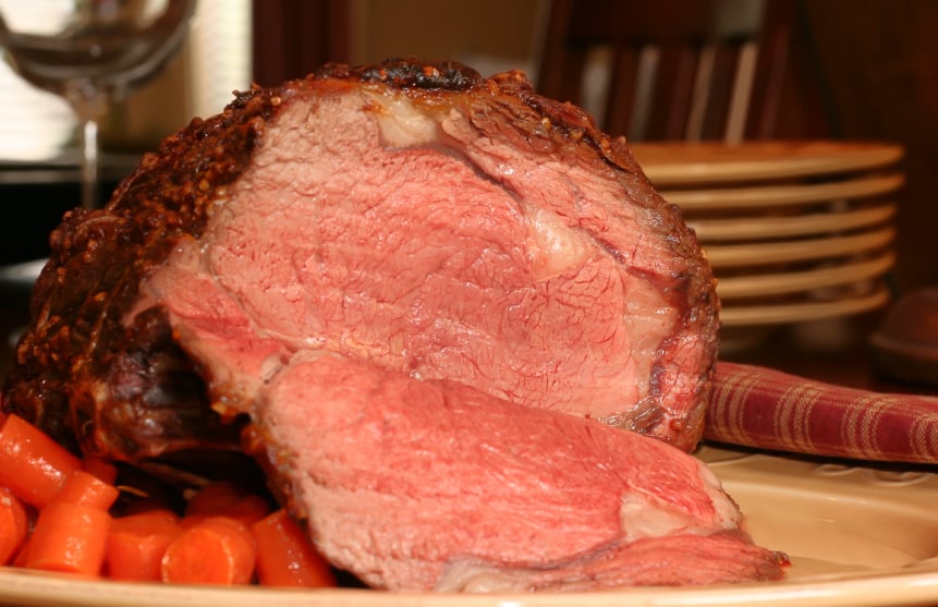 Large roast beef with carrots