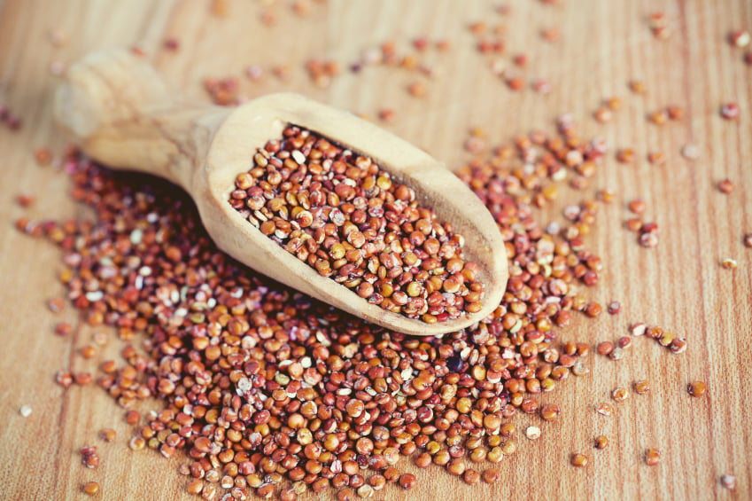 quinoa on wooden background 