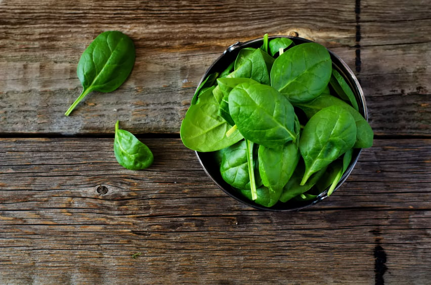 fresh spinach leaves in a bowl
