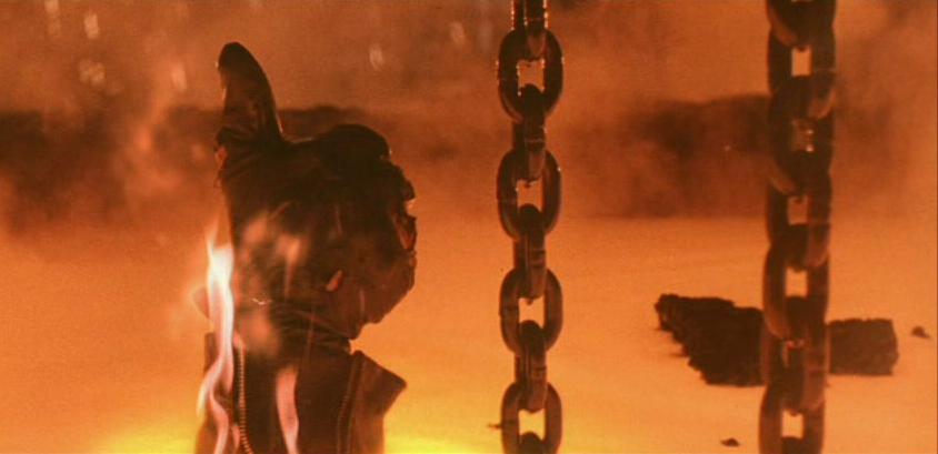 a still of a mans hand giving the thumbs up by chains in Terminator 2: Judgment Day