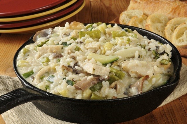 skillet with rice, vegetables and cheese