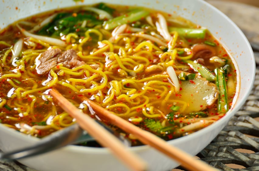 bowl of ramen with chopsticks