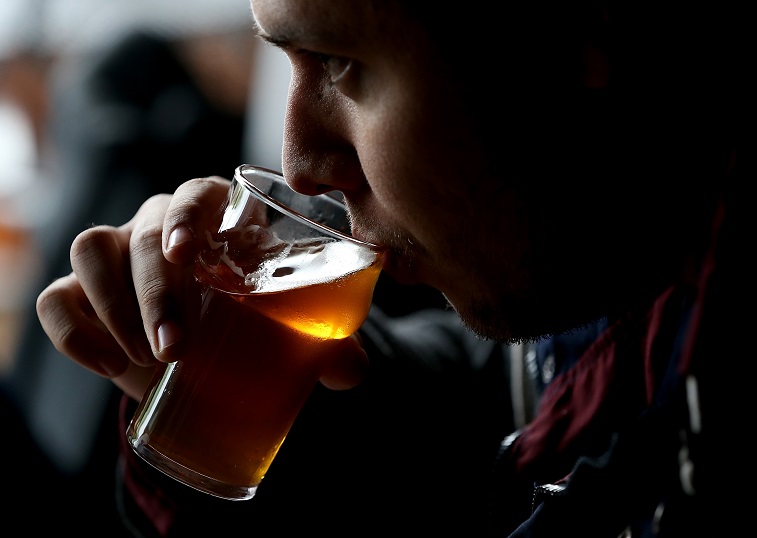 A Russian River Brewing Company customer takes a sip - Justin Sullivan/Getty Images