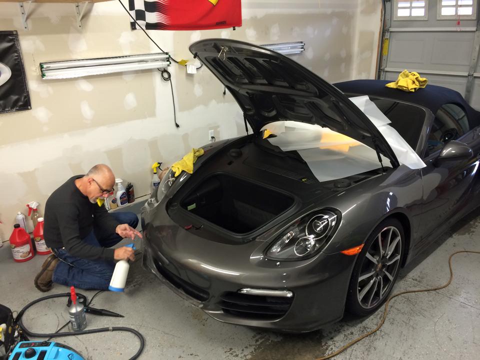 Man taking care of car