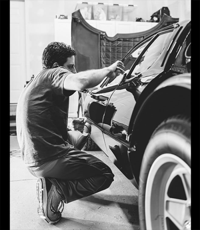 Man working on car