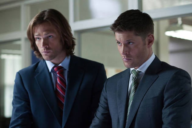 Jared Paladecki and Jensen Ackles stand next to each other in Supernatural