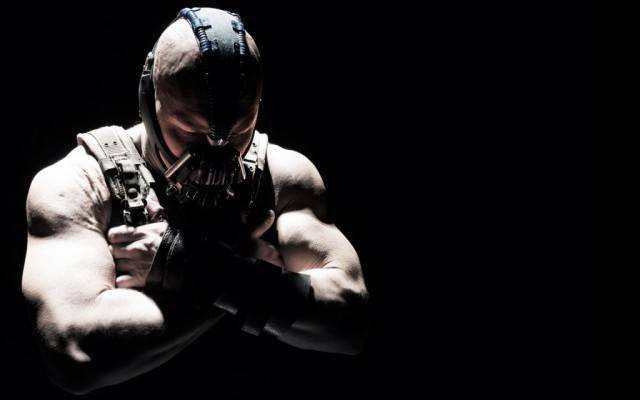 Tom Hardy wears a mask as Bane in The Dark Knight Rises