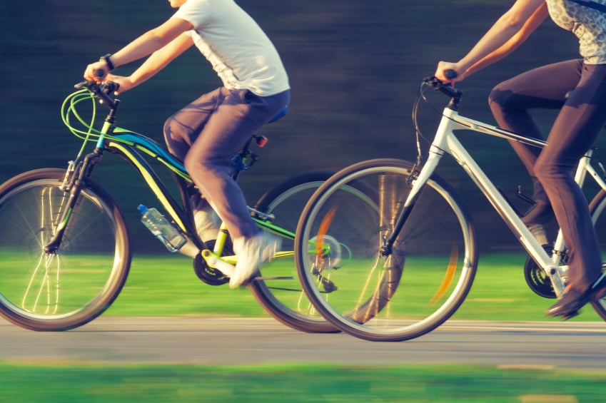 Cyclists, bike riding