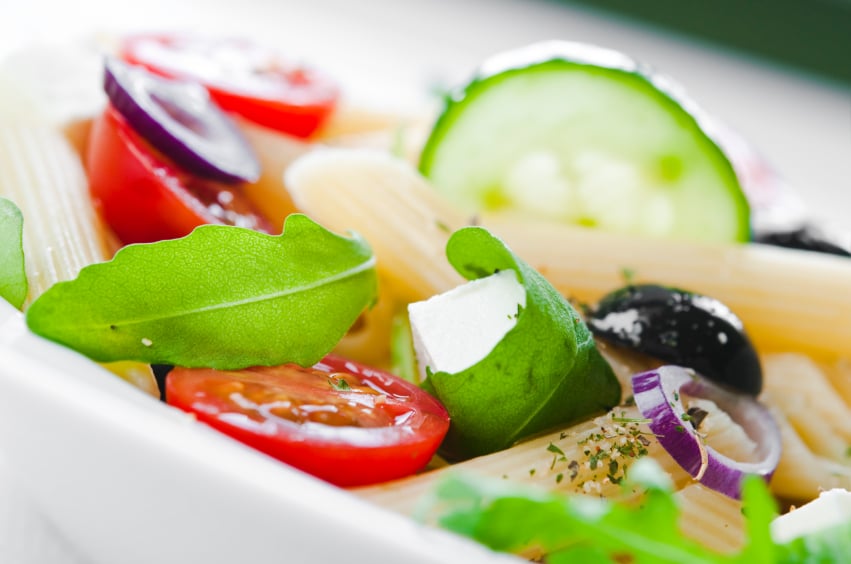 pasta salad, olives, tomatoes