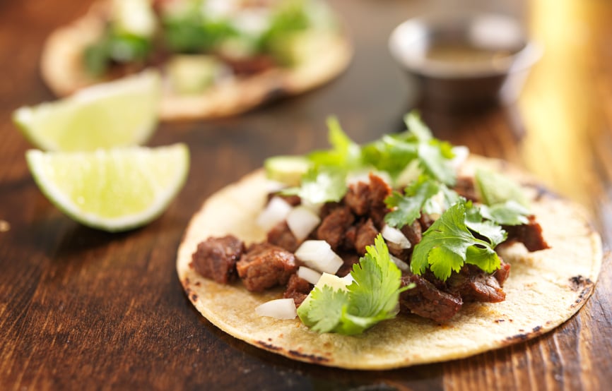 tacos on a wooden surface