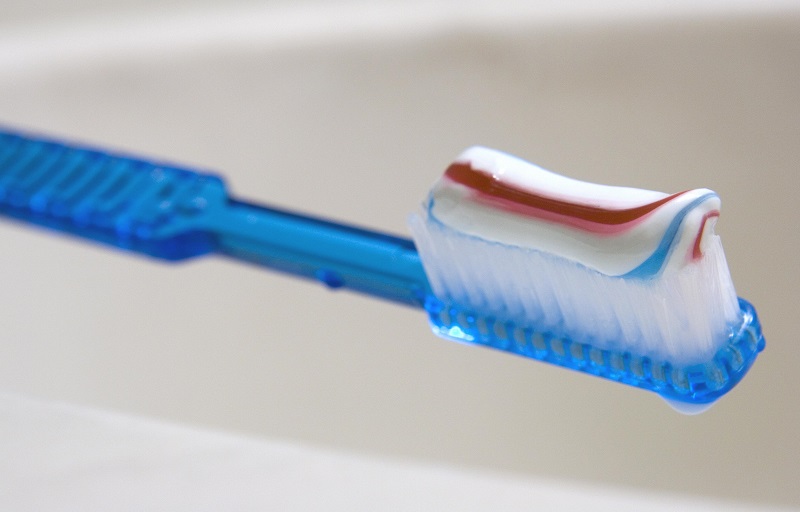 a toothbrush with toothpaste