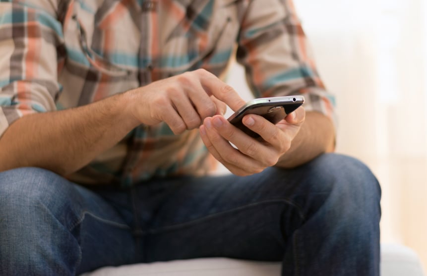 man using smartphone