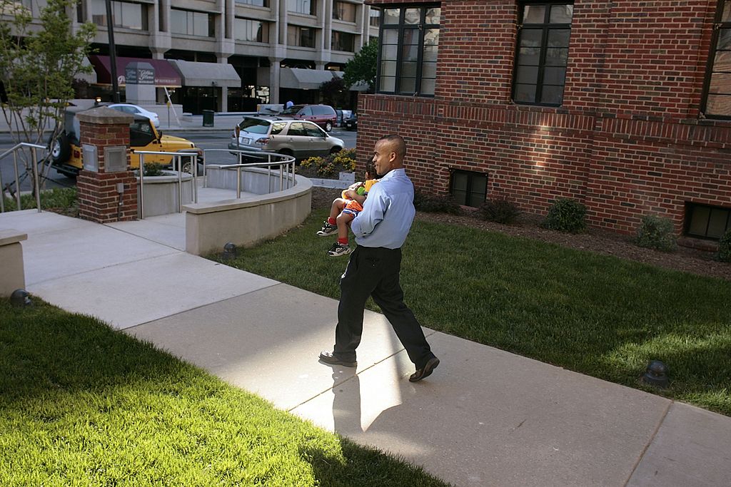 man outside apartment building