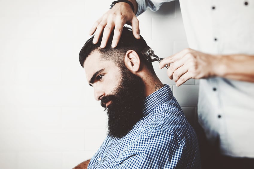 Bearded man in a barber shop, haircut