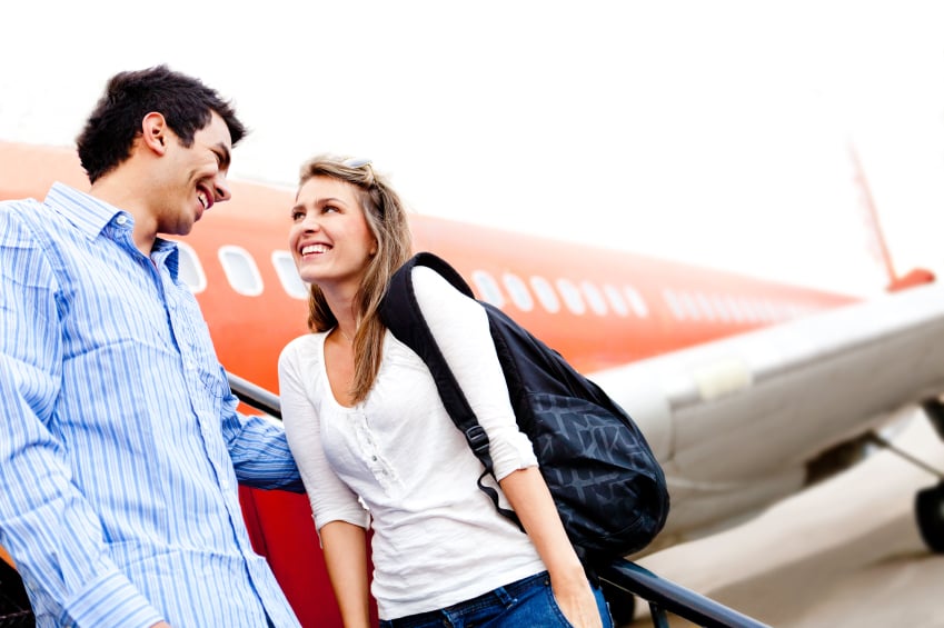 Couple traveling by airplane