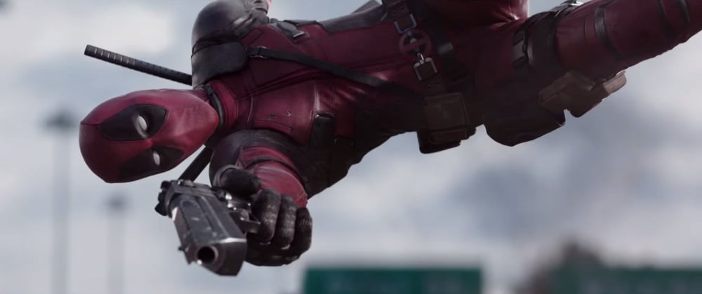 Deadpool soaring majestically through the air