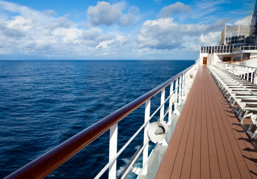 Empty sun loungers on deck of cruise ship, boat, travel