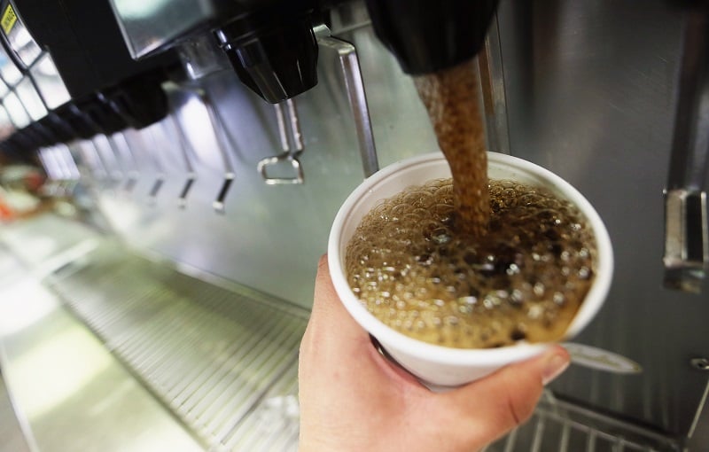 filling cup of soda
