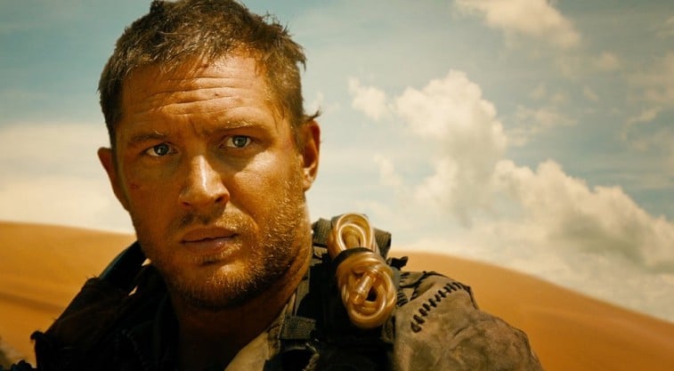 Tom Hardy looks ahead and is in a desert in Mad Max: Fury Road.