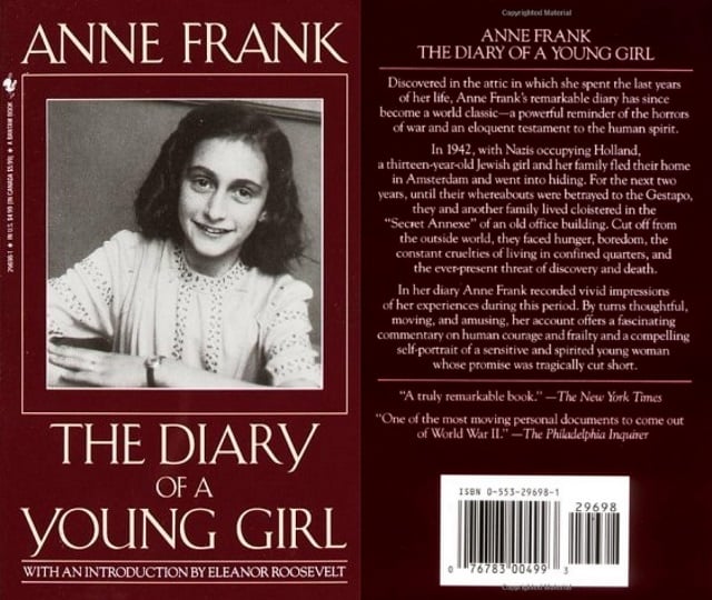 Anne Frank cover art, with the titular young girl smiling in a black and white portrait