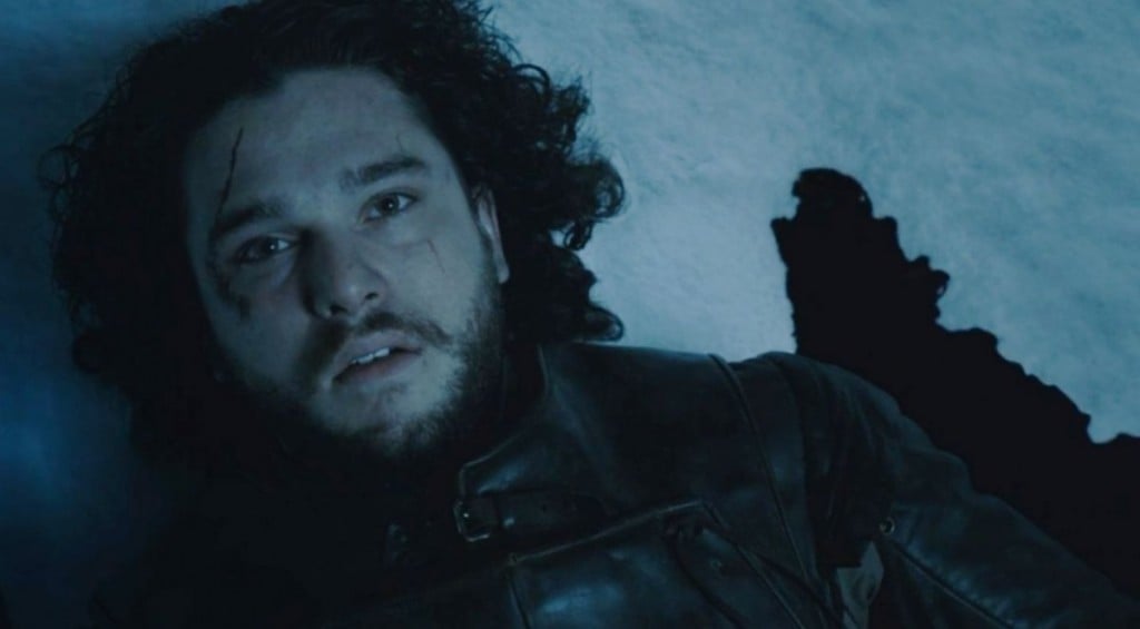 Jon Snow laying dead in the snow