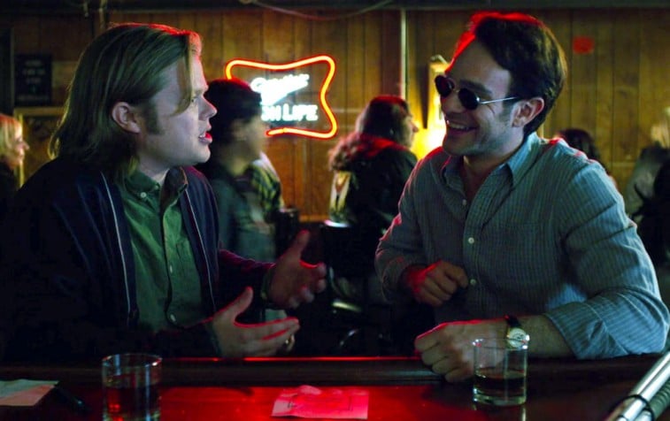 Foggy Nelson and Matt Murdock smiling together at a bar