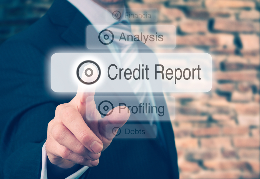 Businessman generating his credit report | Source: iStock