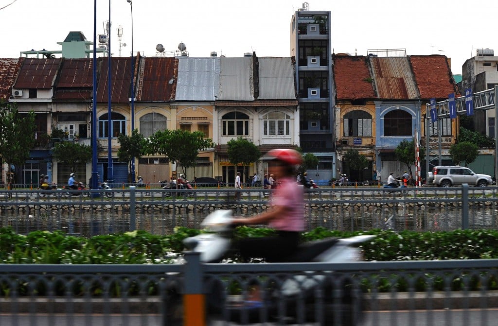 woman on scooter in saigon