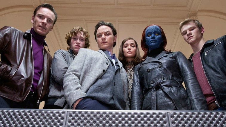 The X-Men gathered on a balcony, looking straight down into the camera