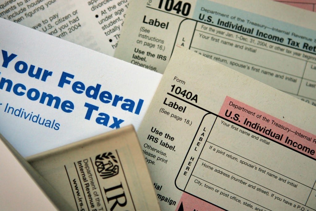 Income tax forms | Photo Illustration by Scott Olson/Getty Images