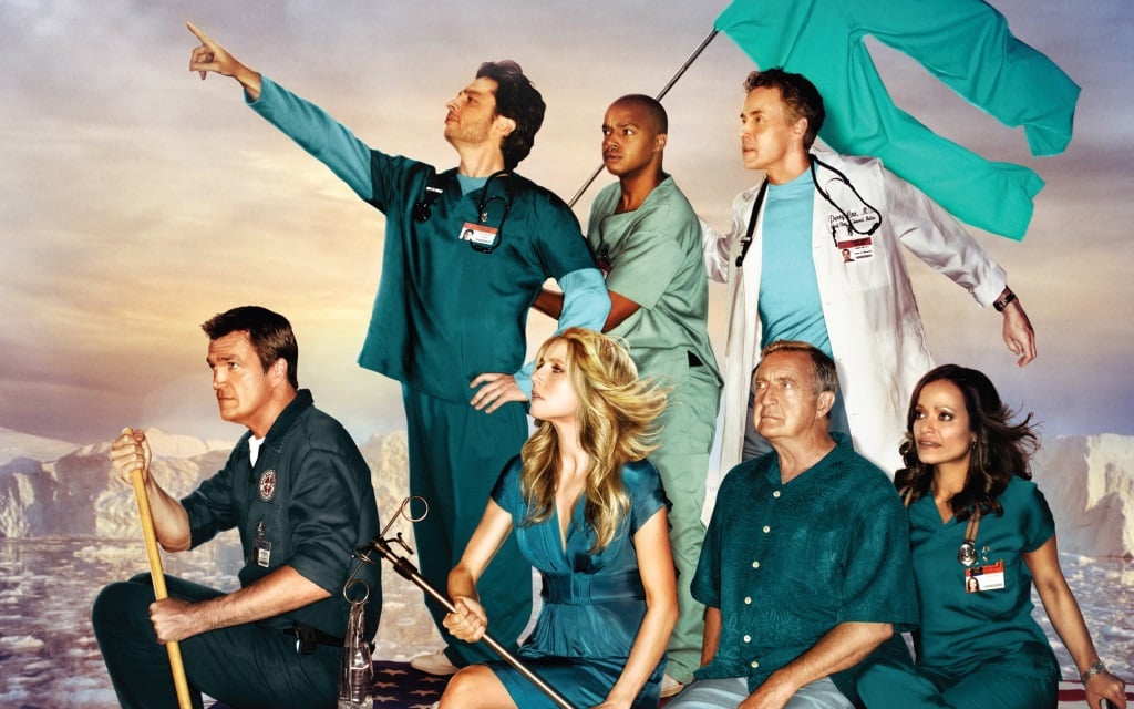The cast of Scrubs on a poster for the show depicting them on a raft in the ocean