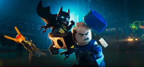Batman kicks a bad guy in a scene from 'The LEGO Batman Movie'