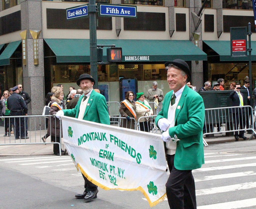 Group of men carrying a banner in New York City St. Patrick's Day Parade