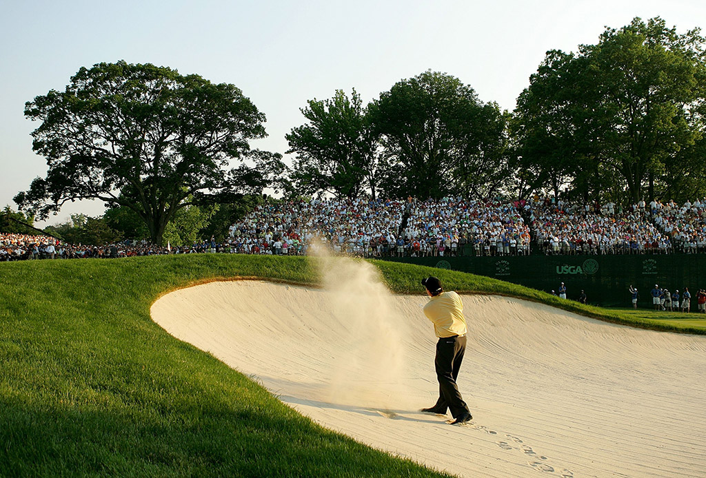 Phil Mickelson playing a bunker shot at Winged Foot Golf Club