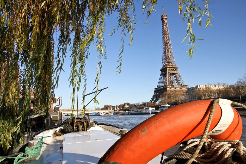 paris houseboat with view of eiffel tower