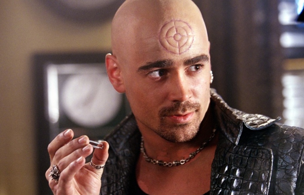 Colin Farrell as Bullseye, holding a paperclip in two fingers and looking to his left