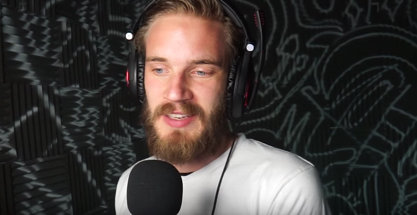 Video game streaming celebrity Pewdiepie speaks into a microphone.