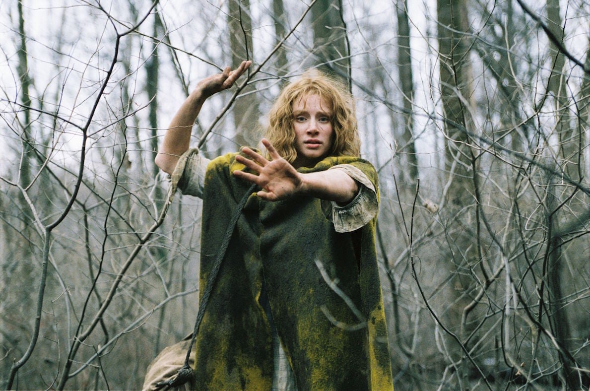 Ivy (Bryce Dallas Howard) escapes in the woods in a scene from 'The Village'