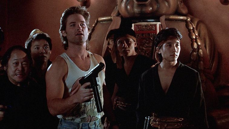 Kurt Russell and several men dressed as ninjas in Big Trouble in Little China