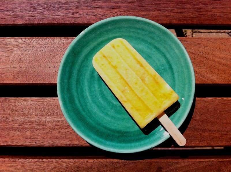 peach ice pop on a plate