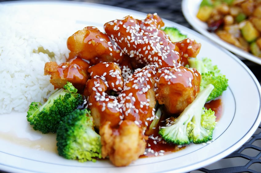 close up of sesame chicken in a plate