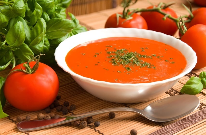 white bowl filled with tomato and basil soup