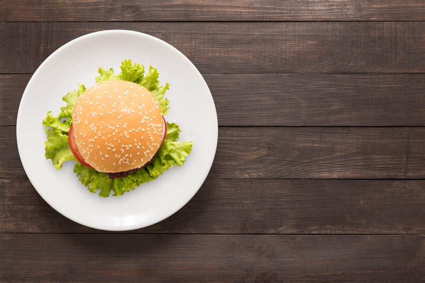 BBQ burger on white dish